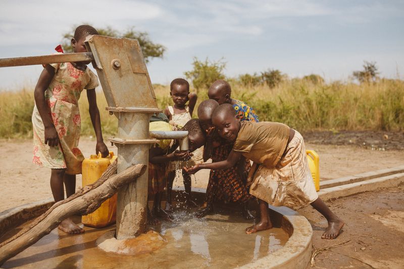 Children gathering water - Uganda